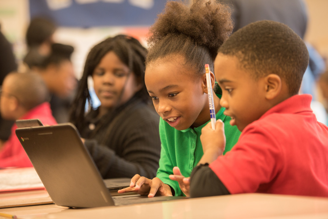 Students with Chromebooks